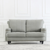 Divano da soggiorno in pelle con mobili contemporanei con pouf
